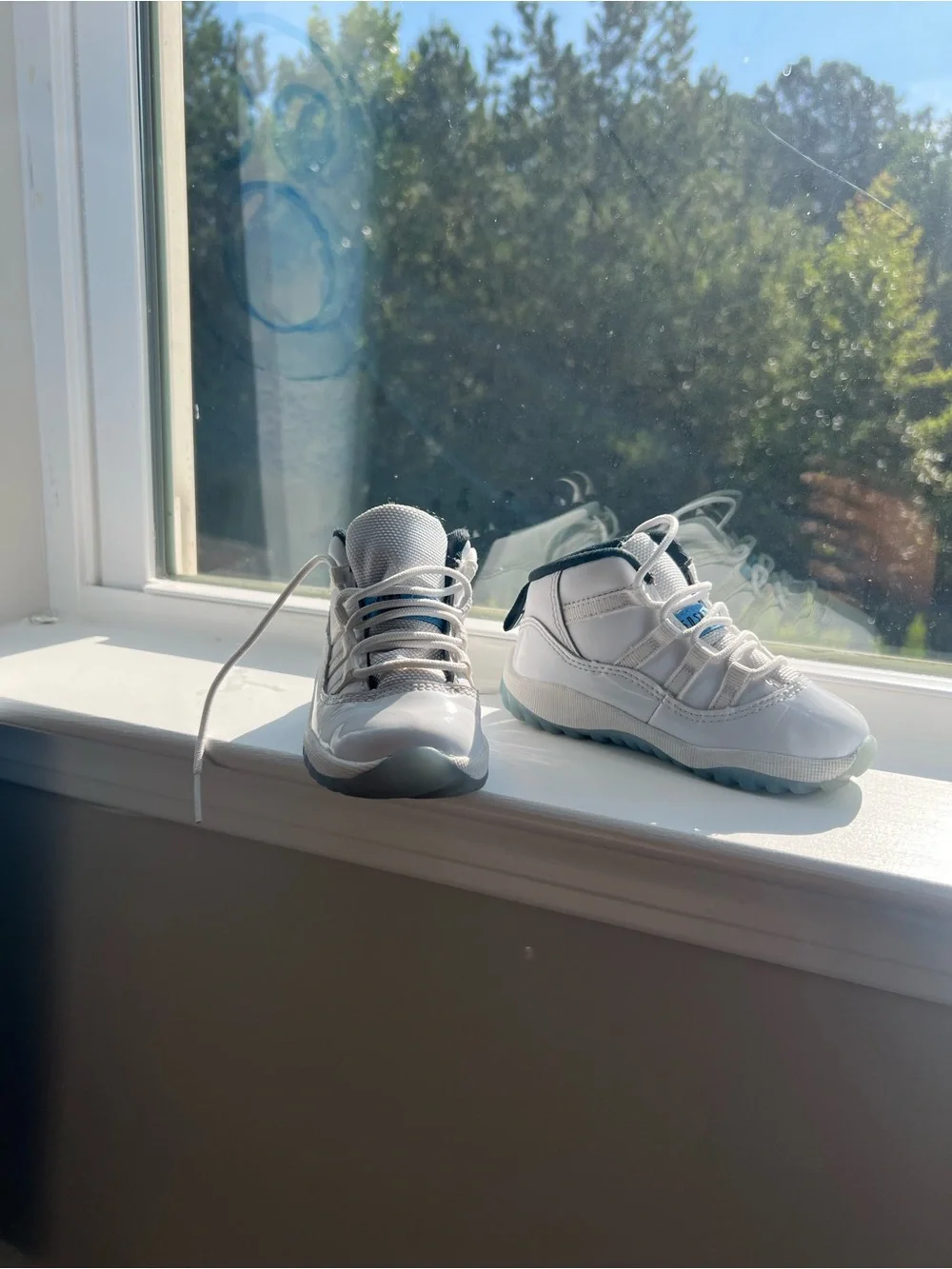 Jordan Kids White High-Tops with Light Blue Accents